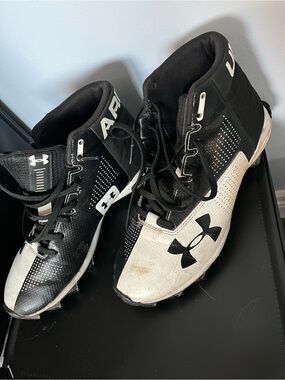 Under armour cleats size 6Y / W7
